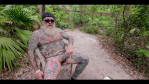 Inked Daddy Bear Stroking and Pissing in the Woods