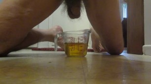 Pissing in a Measuring Cup!