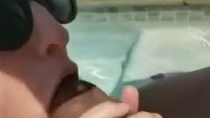 Sucking bbc in the pool