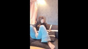 Cute woman masturbating while watching a pornographic video